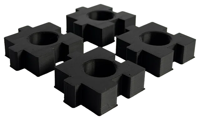 Four empty Puzzle Grid tiles with square snap tabs